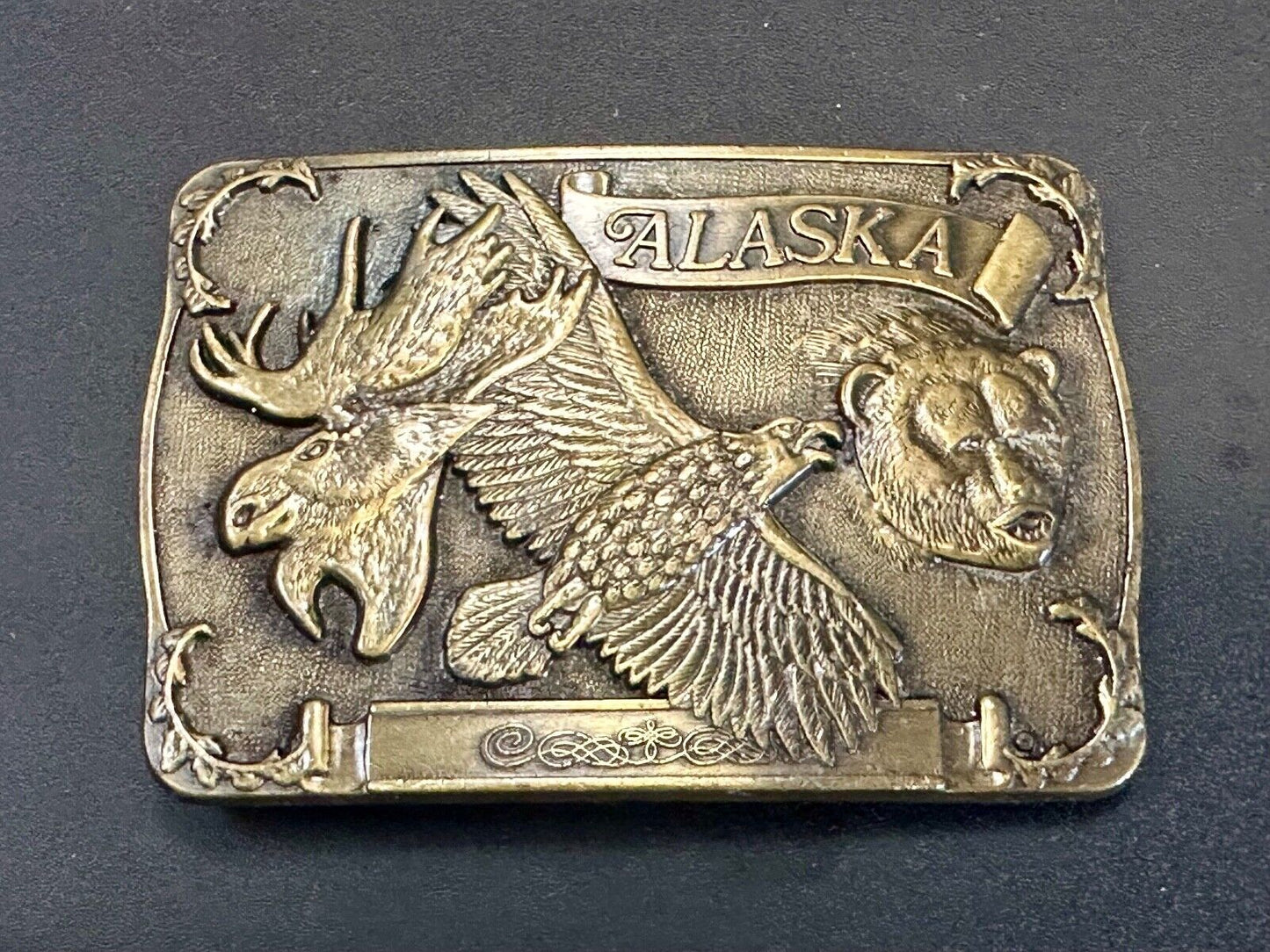 Alaska the great land State Wildlife Commemorative belt buckle. by RJ
