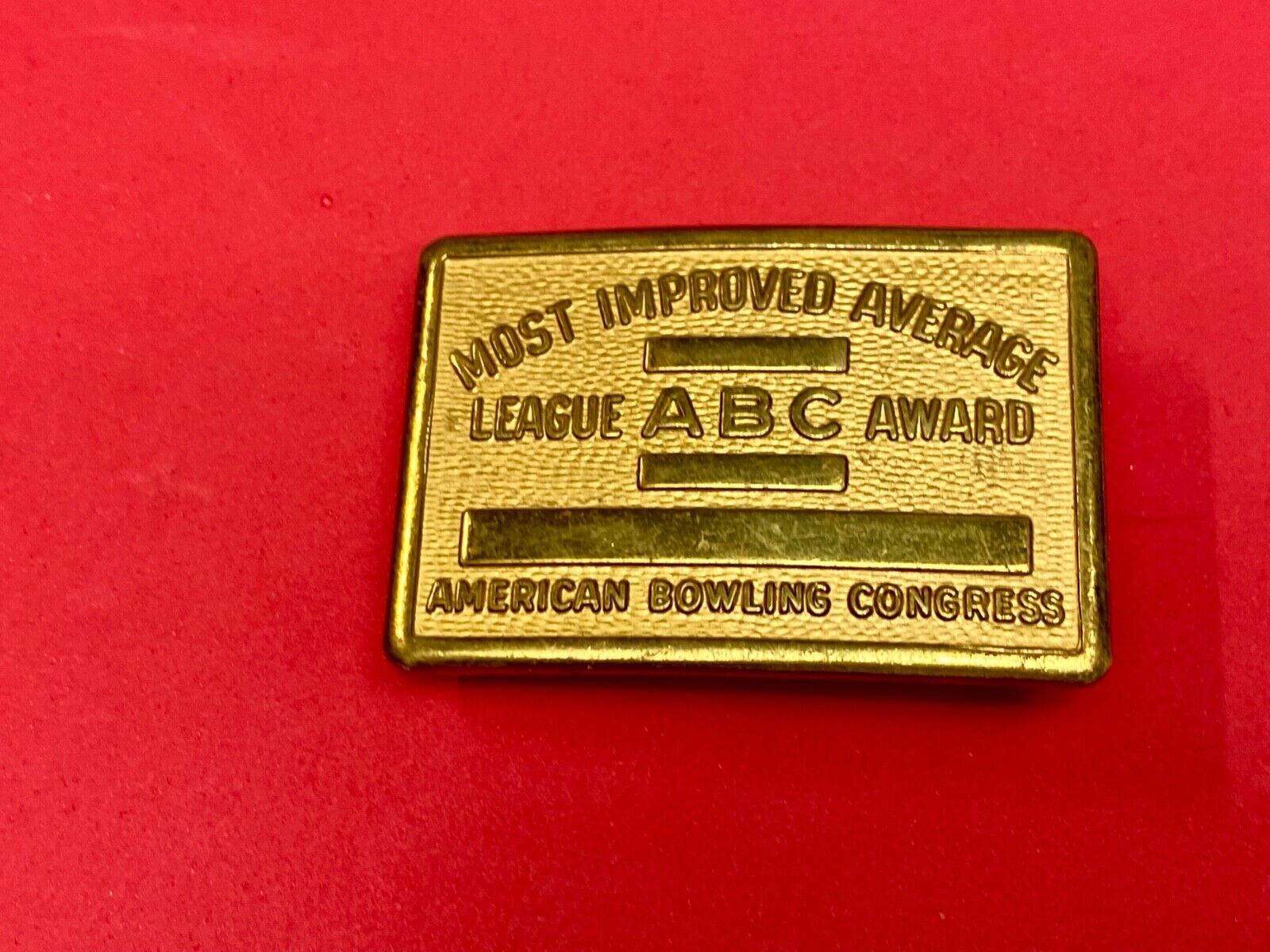 AMERICAN BOWLING CONGRESS MOST IMPROVED AVERAGE AWARD BELT BUCKLE BLANK RIBBON