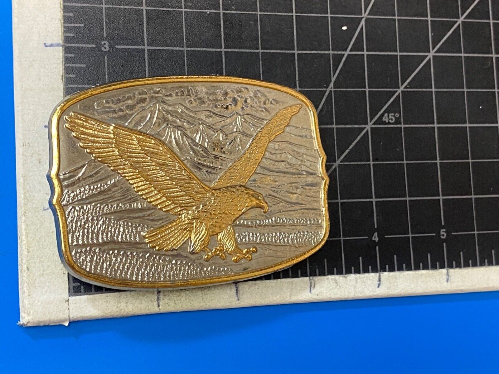 AMERICAN EAGLE Majestically hunting flying over mountains Numbered belt buckle