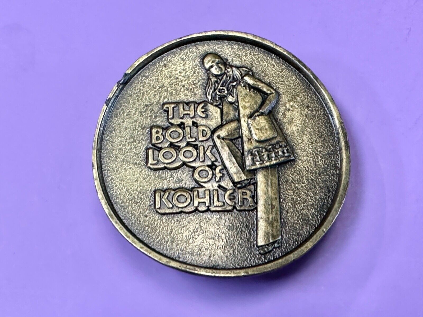 The Bold Look of Kohler Vintage 1977 Lewis round Limited Edition belt buckle