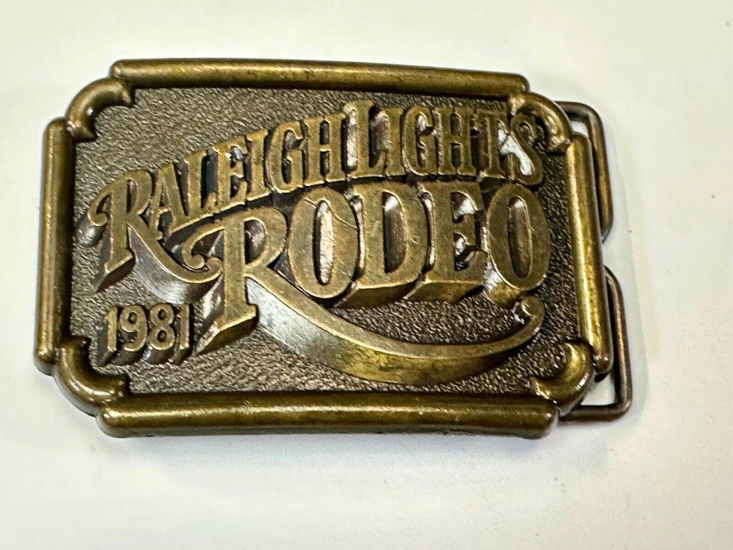 Vintage 1981 RALEIGH LIGHTS RODEO CIGARETTES SPONSOR Brass tone belt buckle
