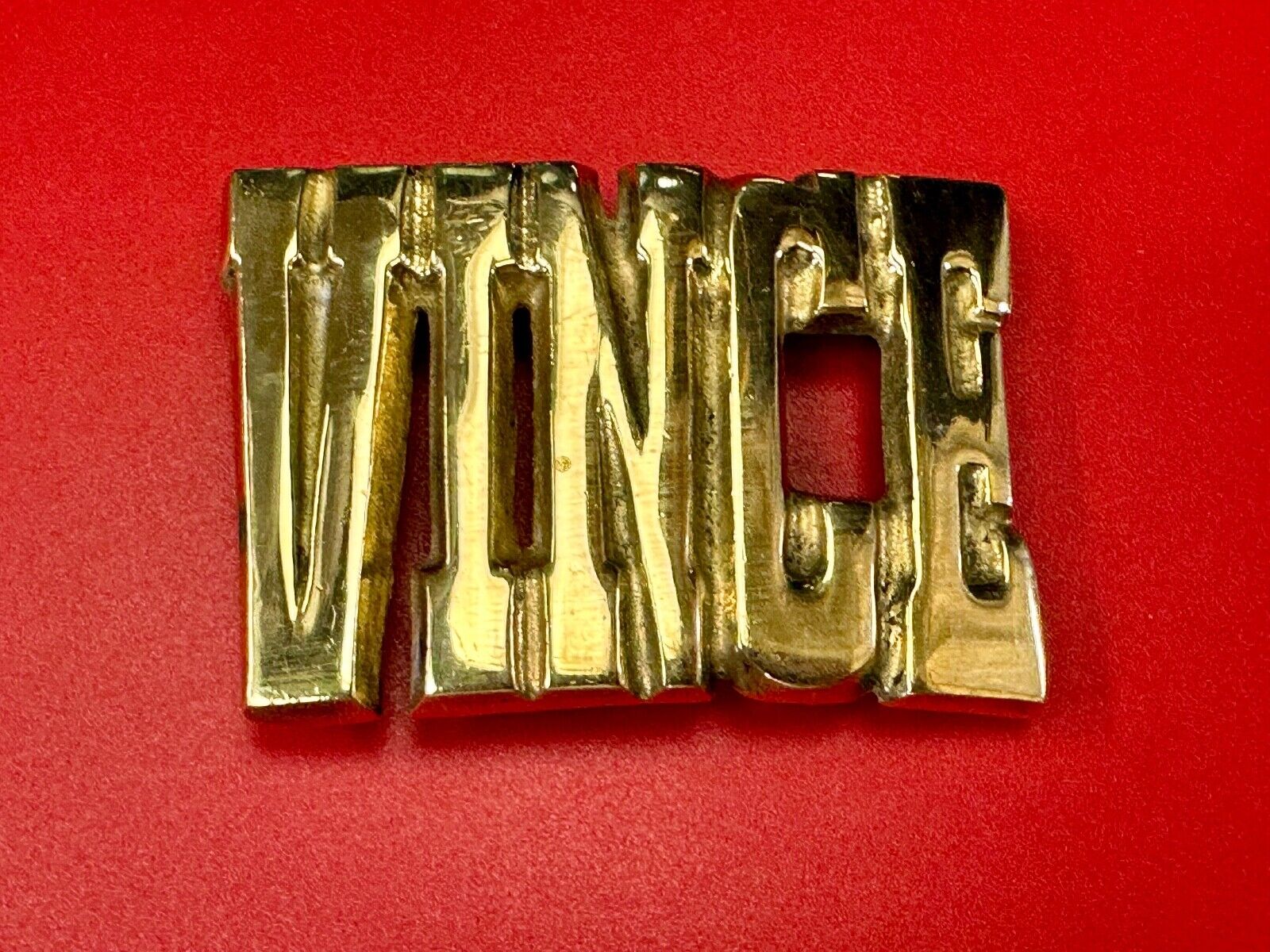 Vince,  Cutout block letters solid brass Vintage belt buckle marked Taiwan ROC