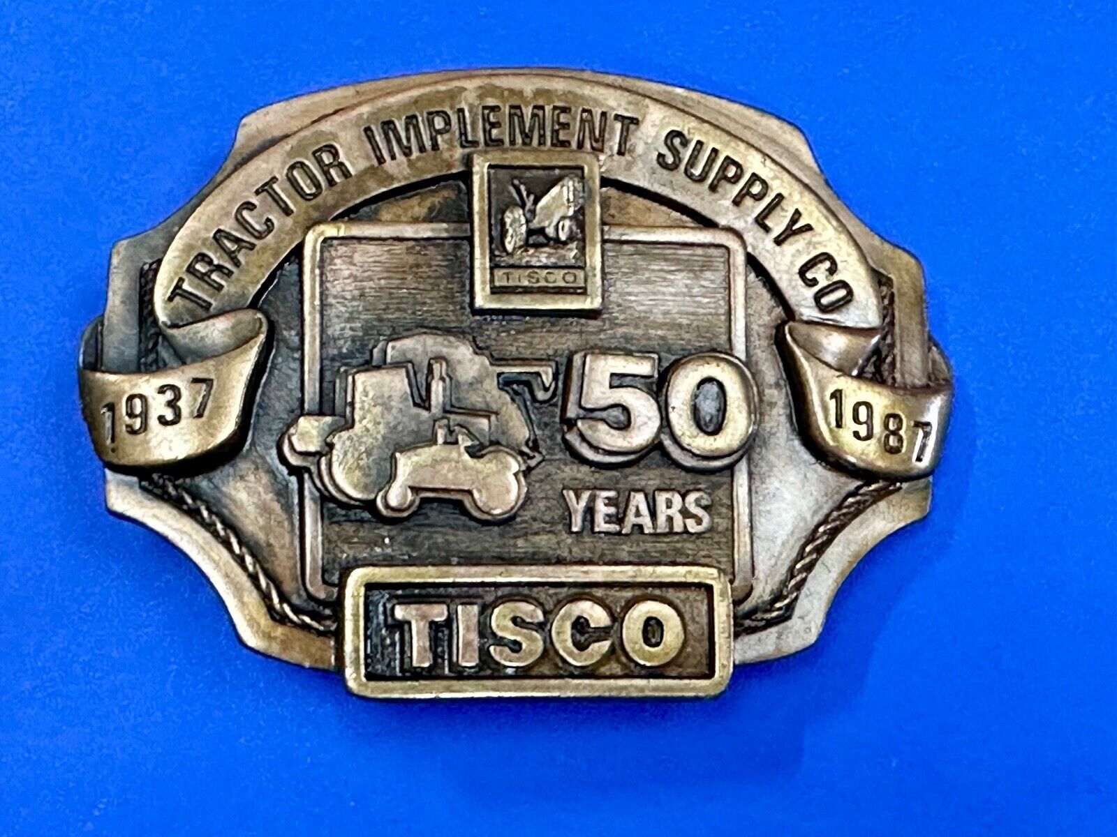 Tisco 50 year celebration Tractor farm supply company promo 1986 belt buckle