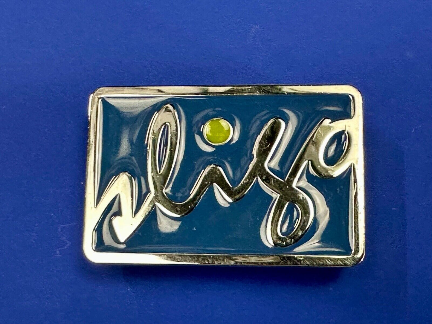 unknown to me!   Sligo Sugowear blue colored emblem or logo belt buckle