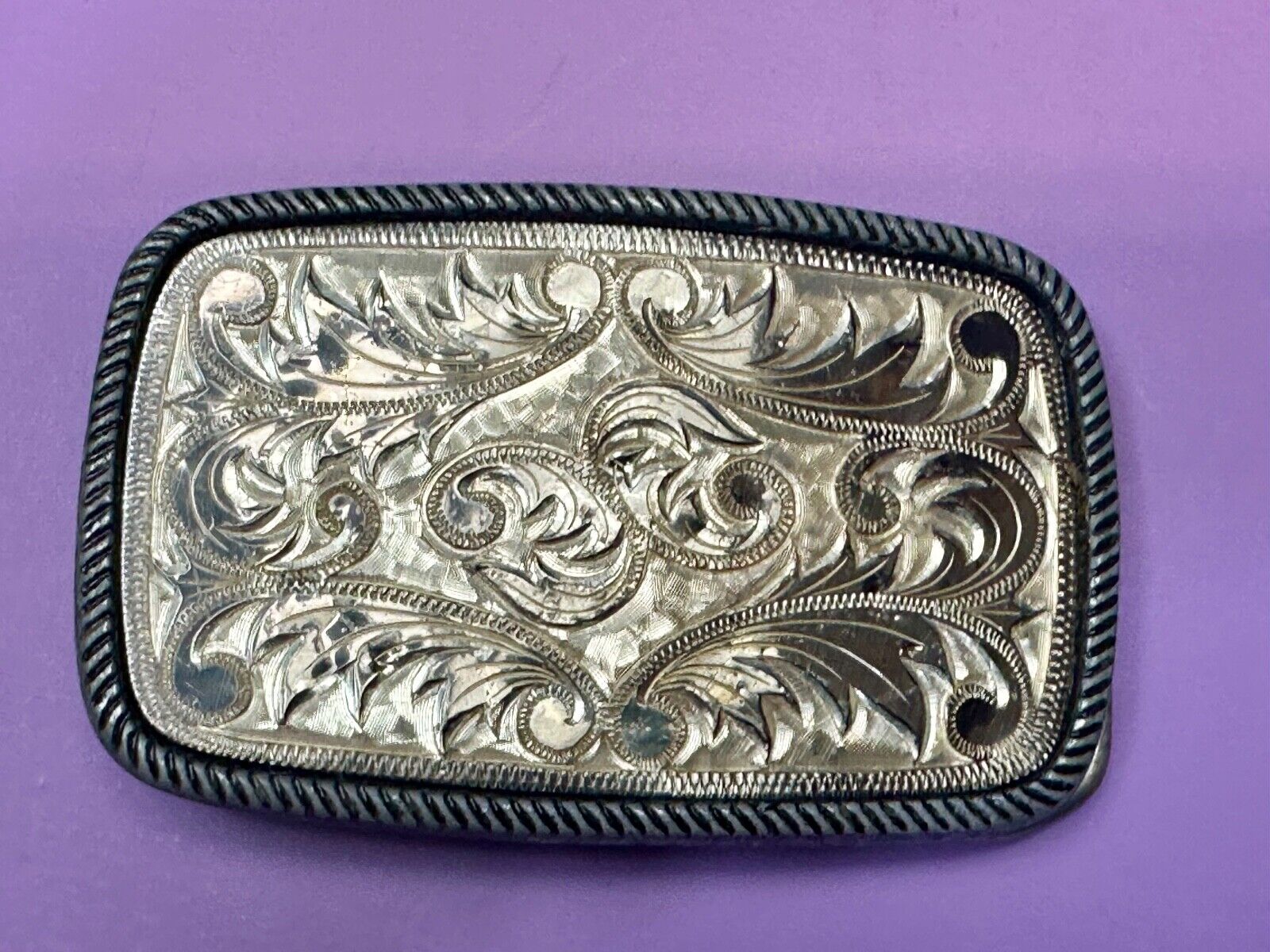 Vintage flower theme etched oval western belt buckle W/ rope border