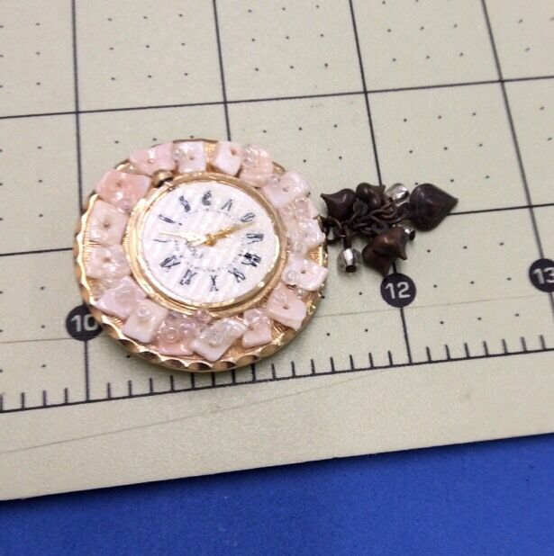 Unique Artisin Hat Flower Pin Broach From Gold Tone Guess Watch - interesting!