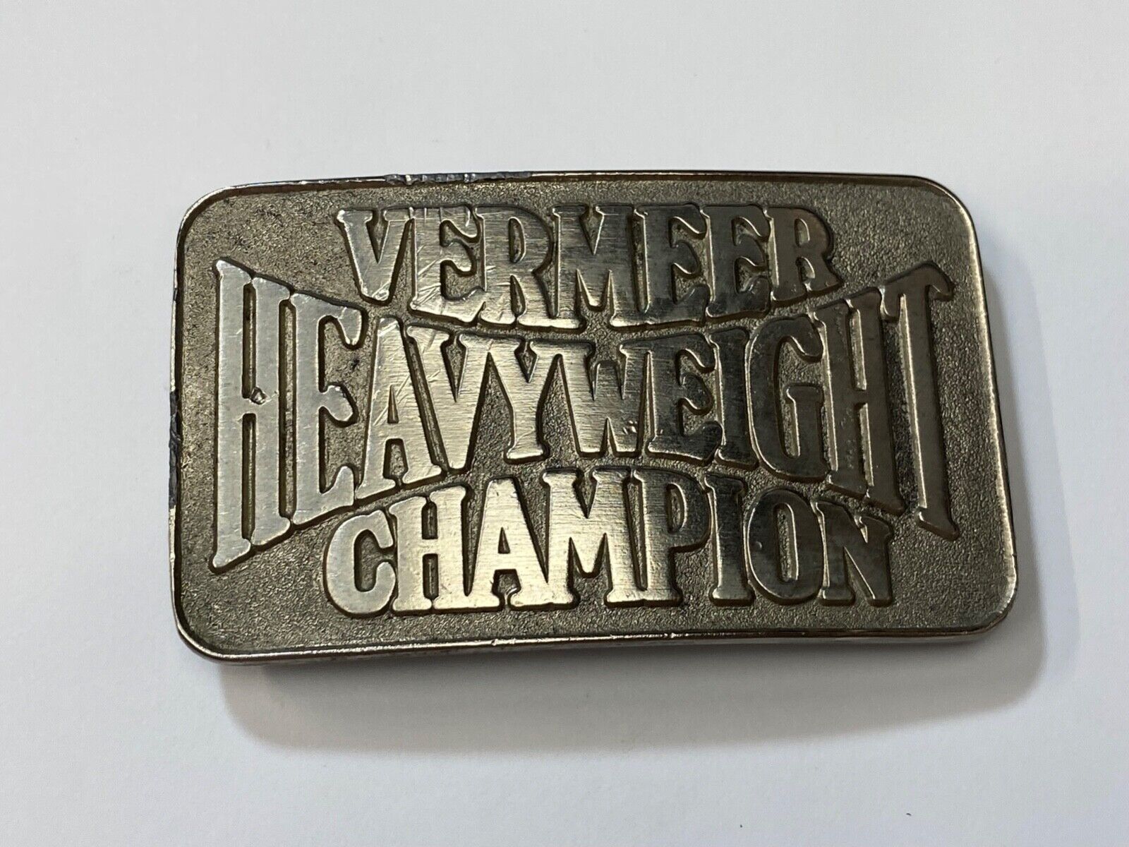 Vermeer Heavyweight Champion Belt Buckle by Spec Cast