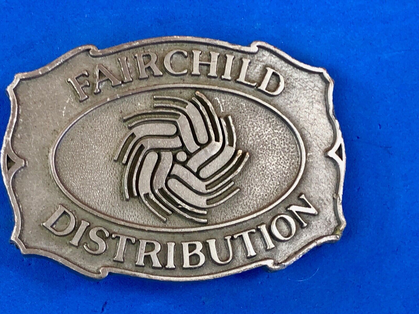 Vintage Fairchild Distribution company logo promotional belt buckle 