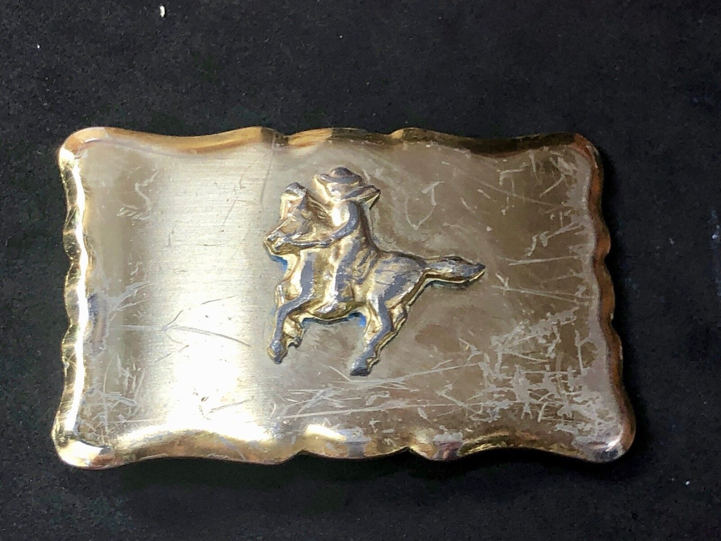 Vintage faceless cowboy on horse pony  riding the trail Western Belt Buckle 