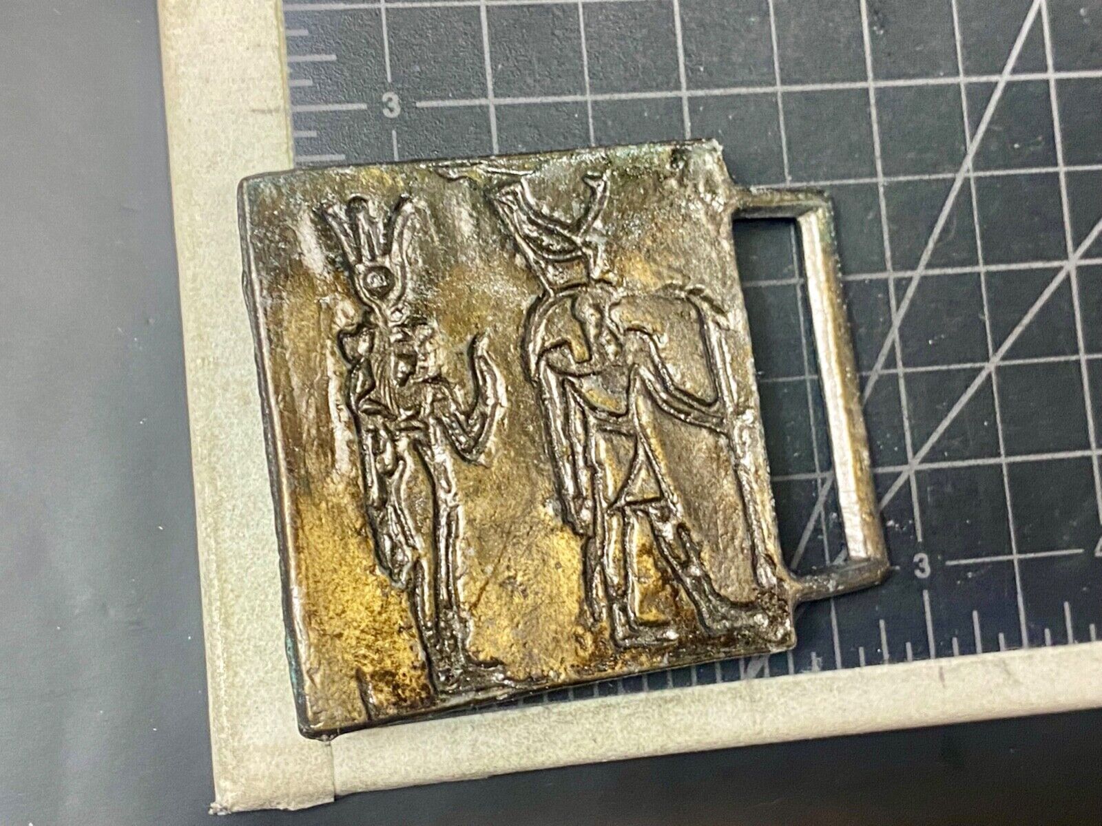Two Tribal Warriors Indian figures?  accoral marked numbered belt buckle