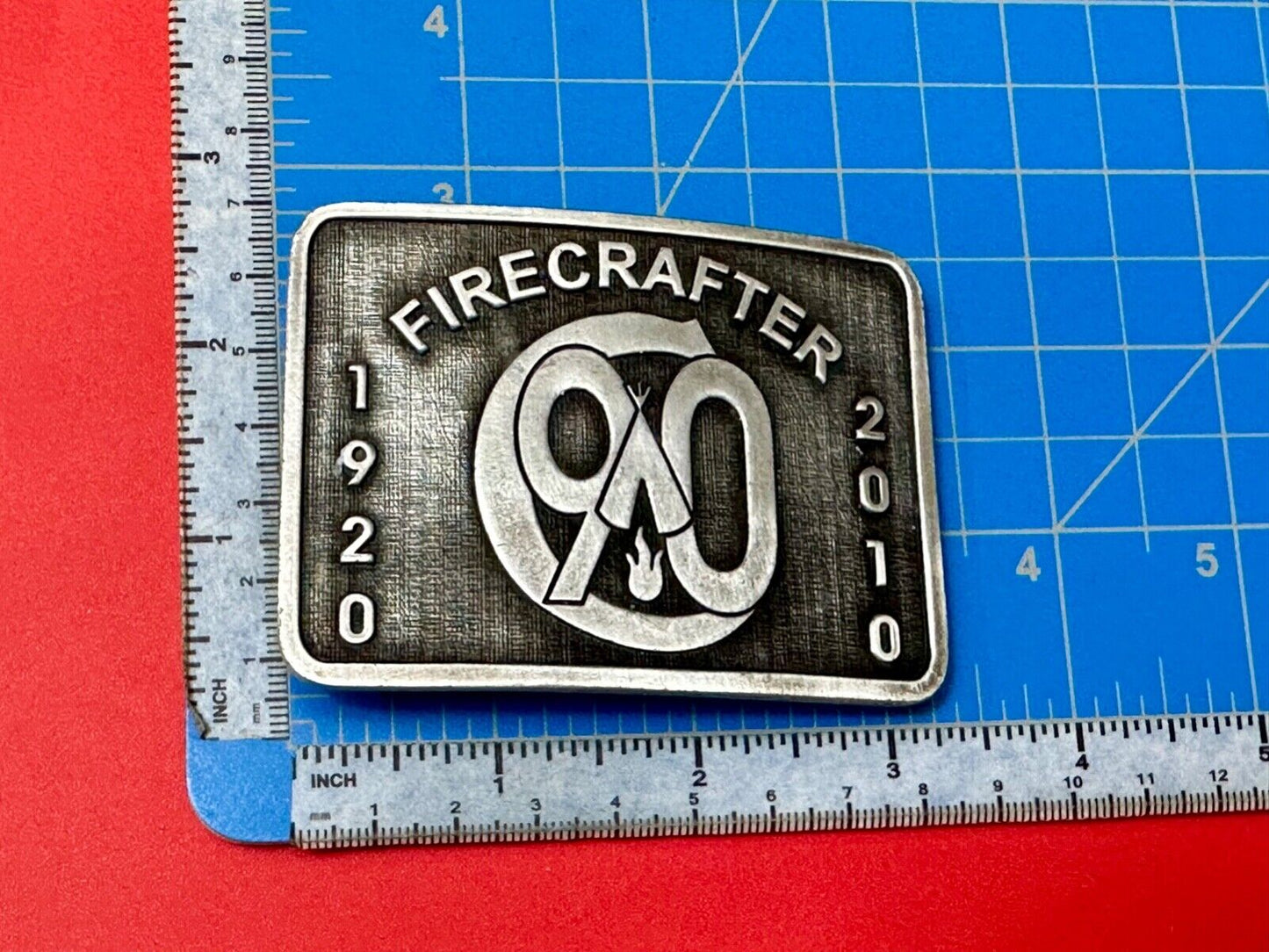 1920 - 2010 Firecracker 90 year celebration belt buckle