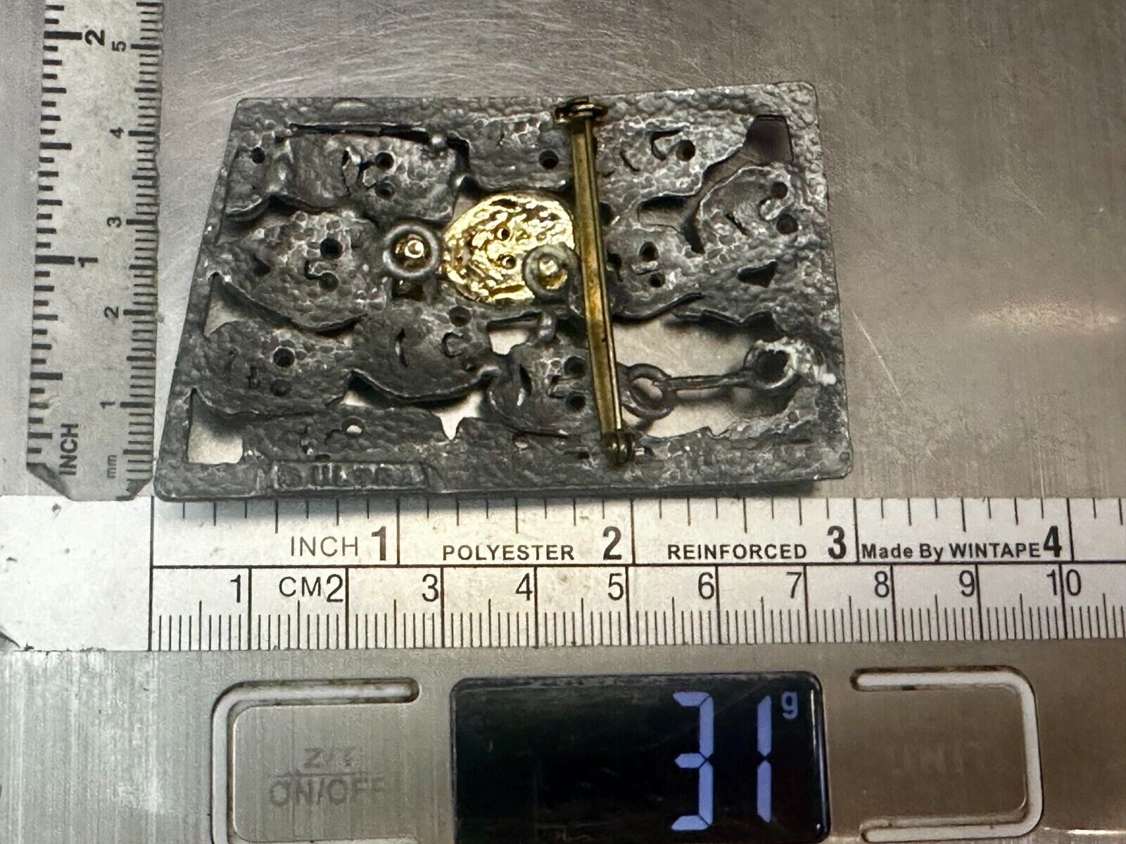 The Standout!  Many Faces in Asymmetric Frame Vintage Pewter Brooch Pin by Ultra