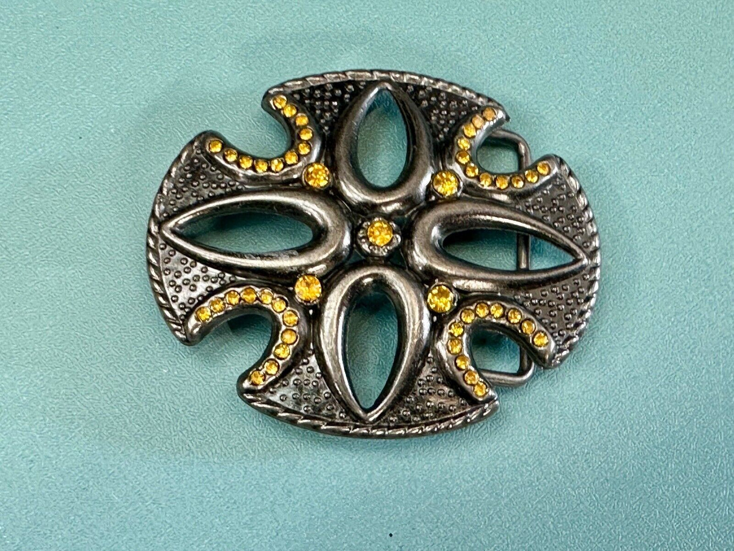 unique see through iron cross with golden brown rhinestone accents
