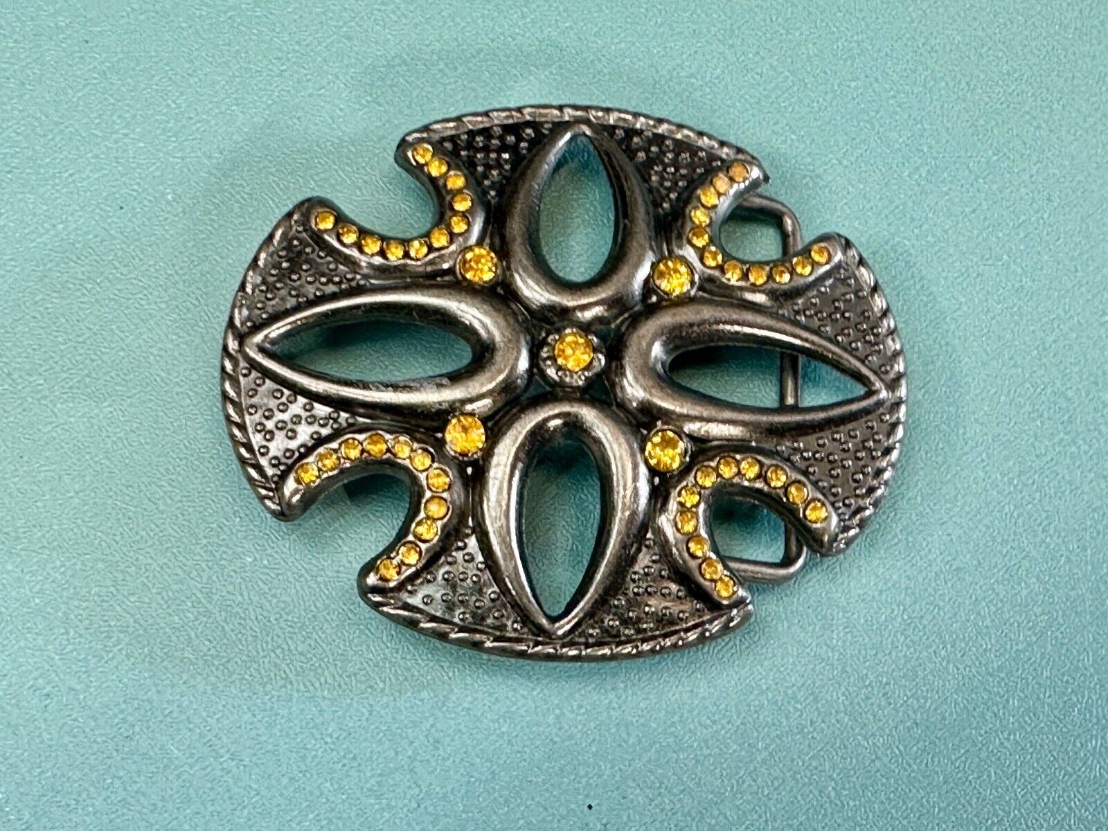 unique see through iron cross with golden brown rhinestone accents