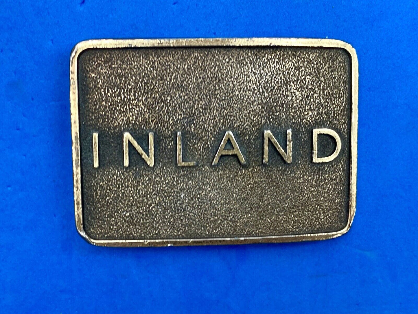 Vintage Inland company belt buckle - truck parts company 