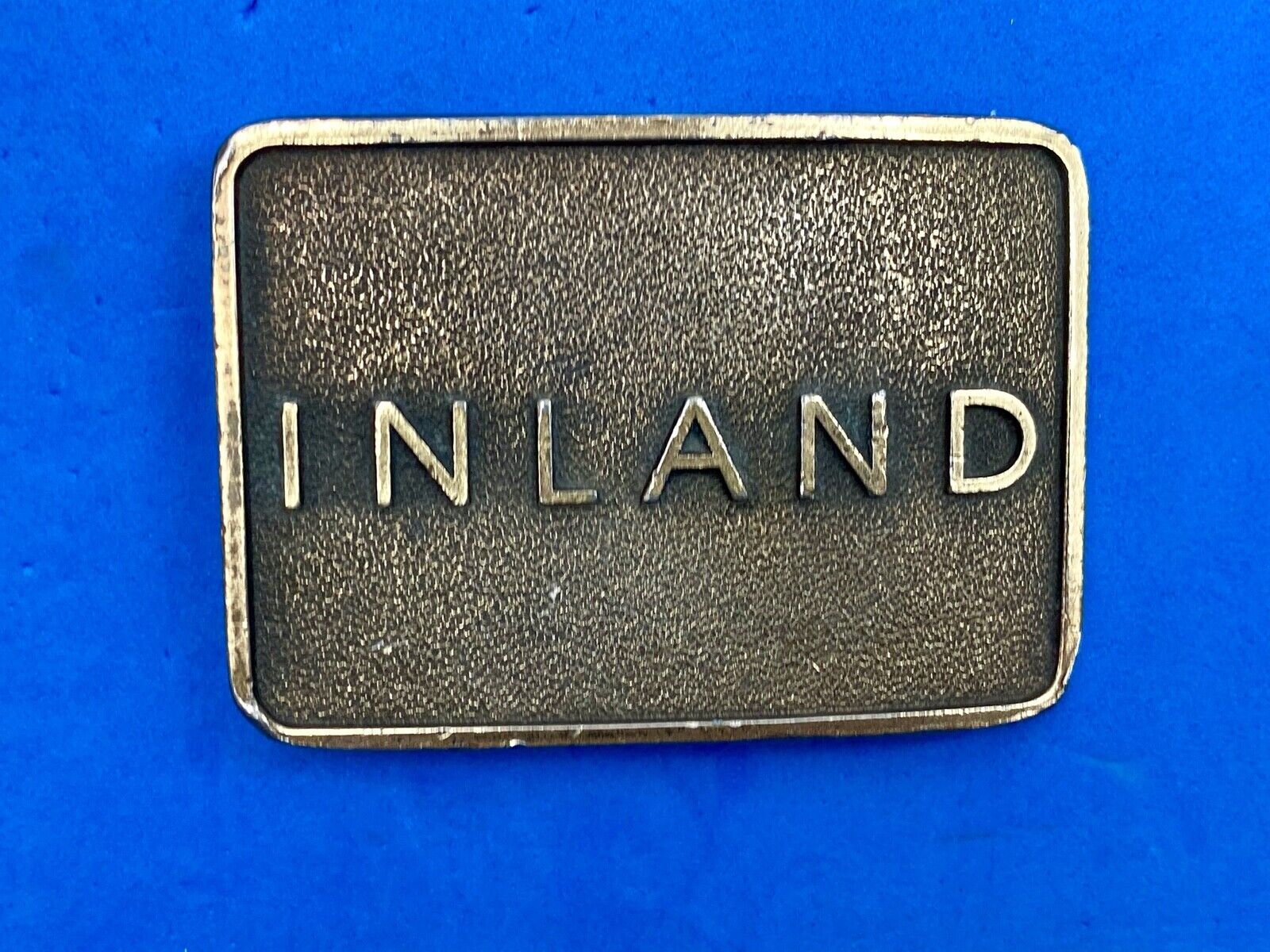 Vintage Inland company belt buckle - truck parts company 