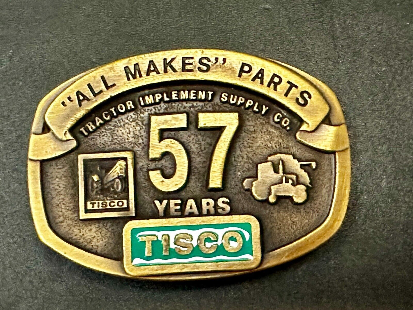 57 Years TISCO Tractor Implement Supply company NOS Belt Buckle by Speccast