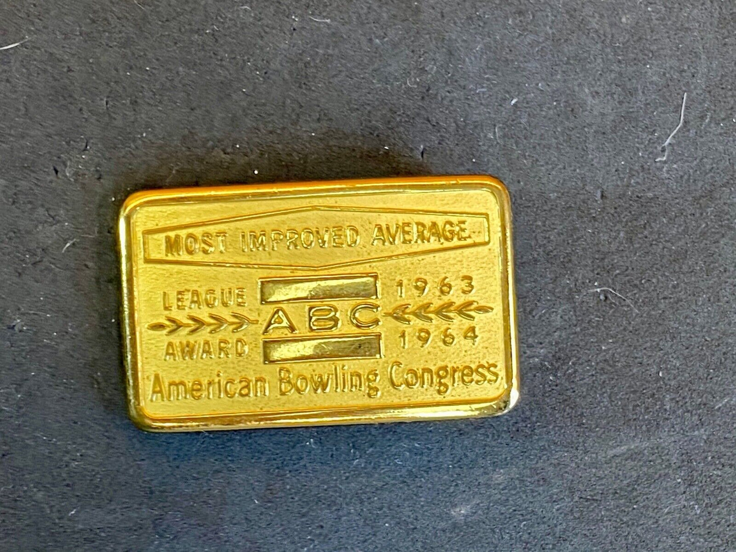 1963, 64 American Bowling Congress Most Improved Average Award Belt Buckle