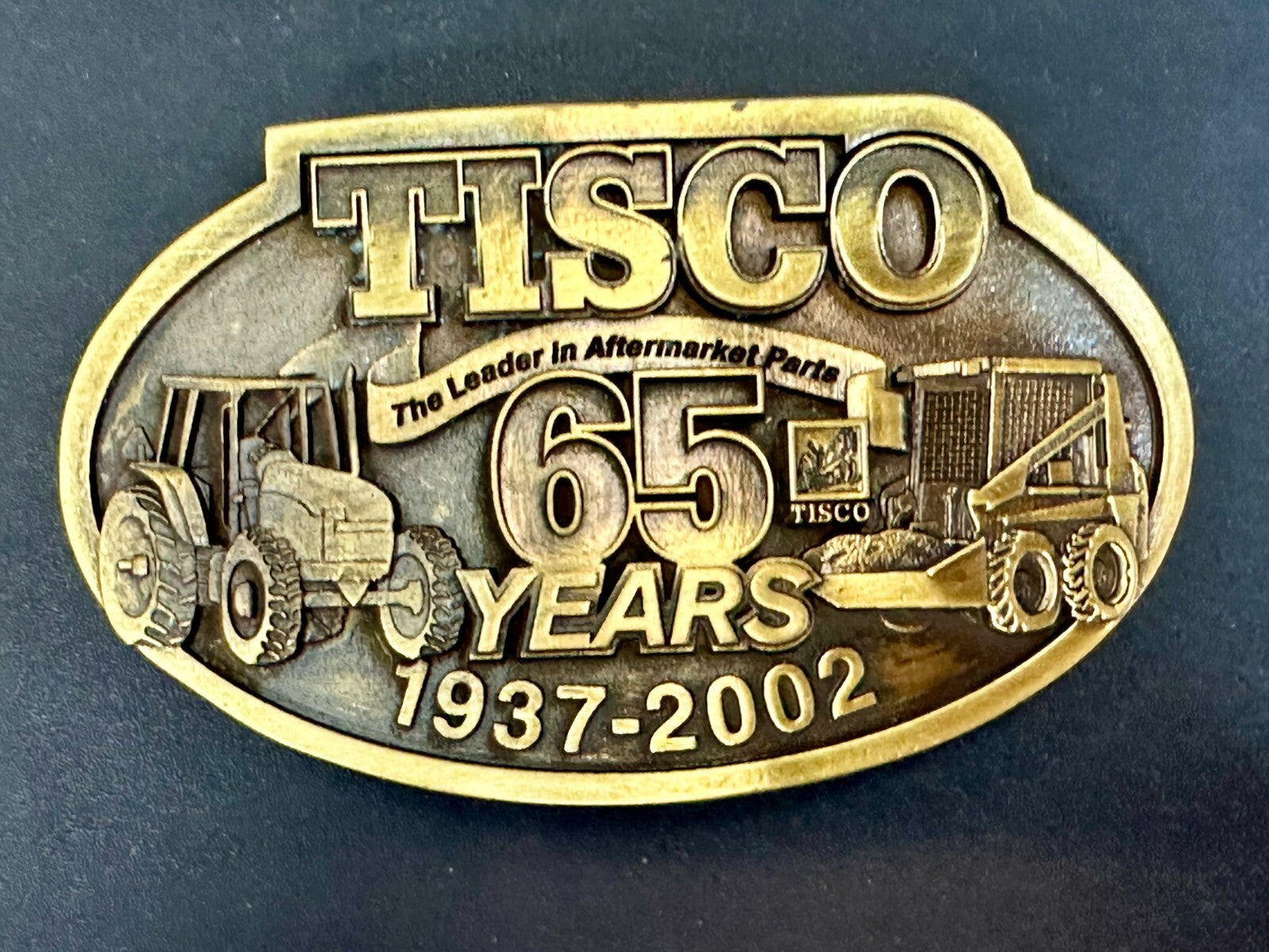 TISCO 65 Years 1937-2002 Series XIV The Leader in Aftermarket Parts Belt Buckle