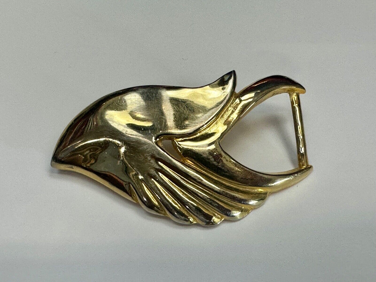 Abstract Art - Wings  gold tone belt buckle signed Leather shop