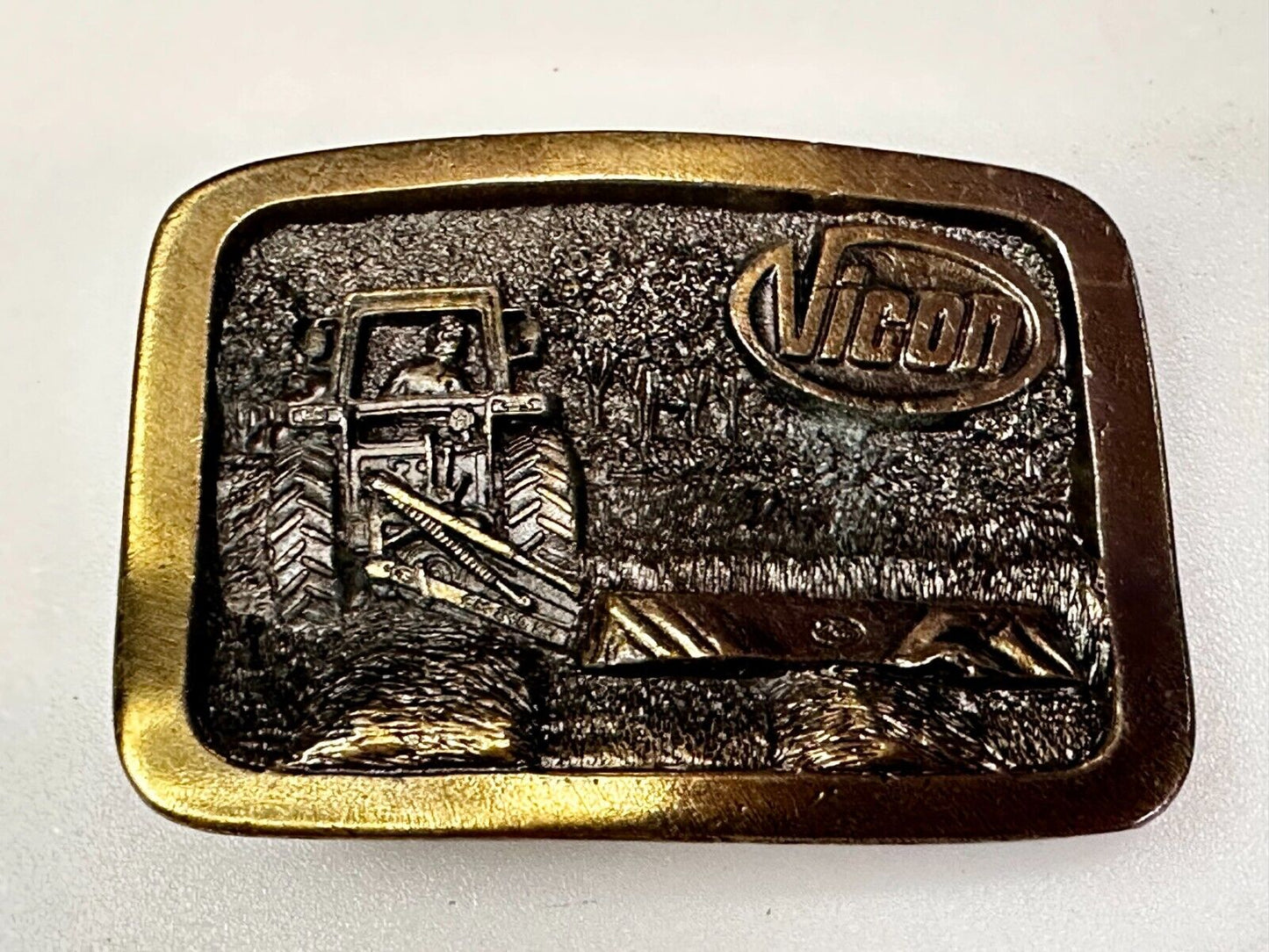 Vicon Disk Mower Tractor Promotional Belt Buckle by Premium Specialties