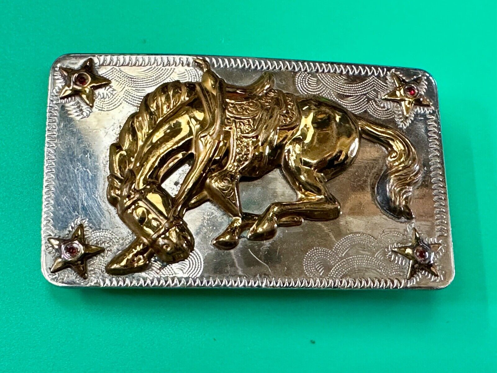 Vintage Horse w/  head down end of the trail Nickel Silver belt buckle w/ Stars