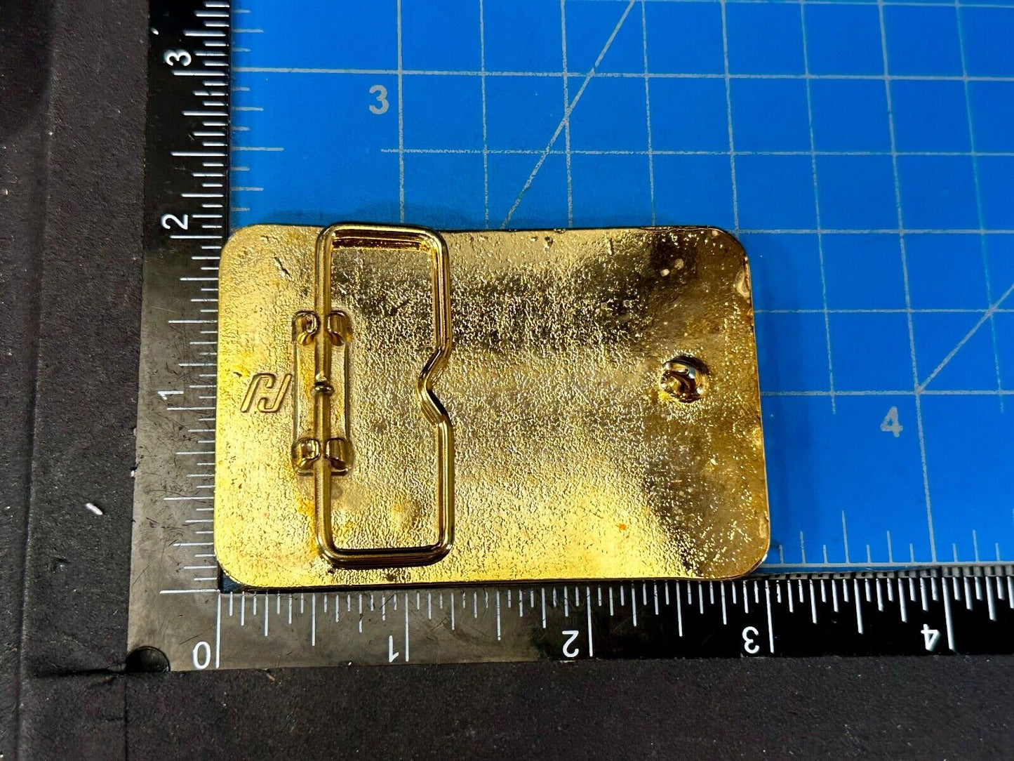 Austin Texas Distributing and Manufacturing 1987 Gold Tone Belt Buckle