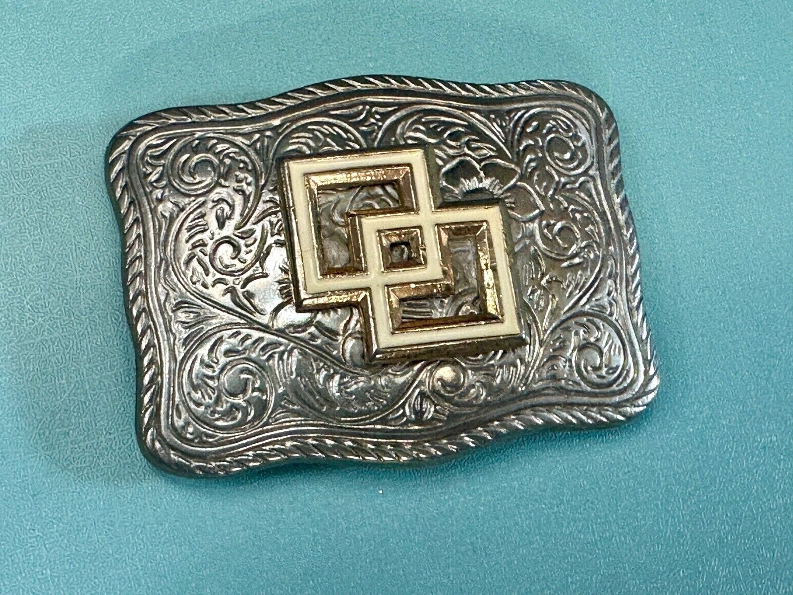 Two Squares pattern - centered in western flower swirl design belt buckle