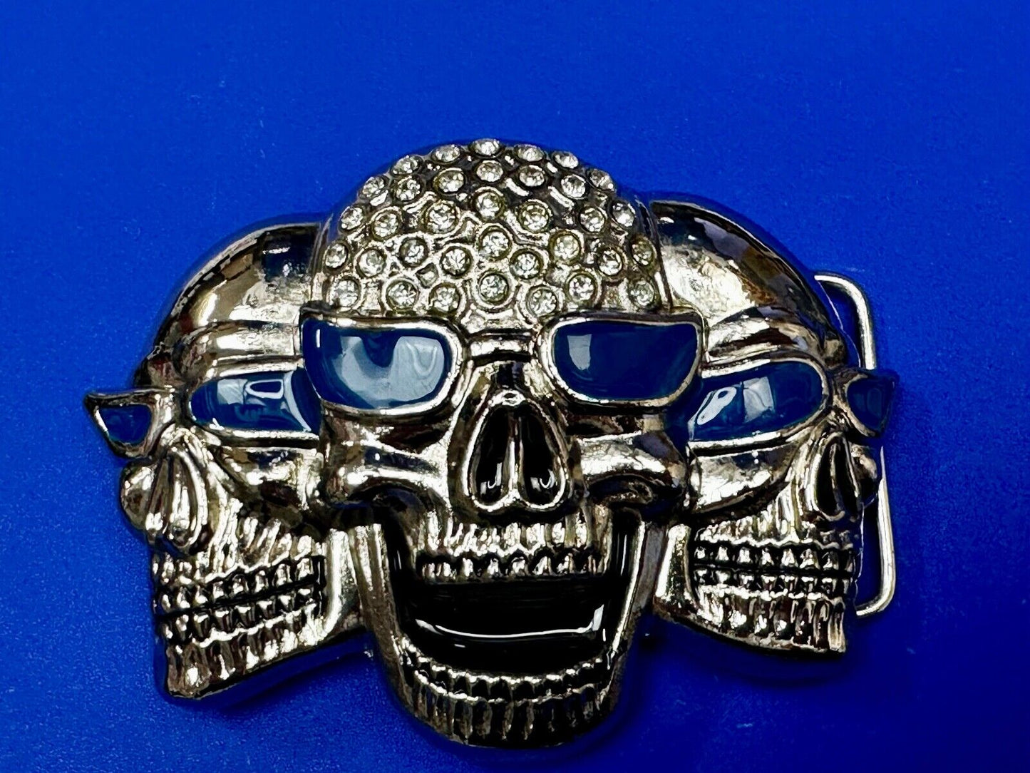 Three Skull's Heads Rhinestone Accented W/ Blue Shades Silver Tone Belt Buckle
