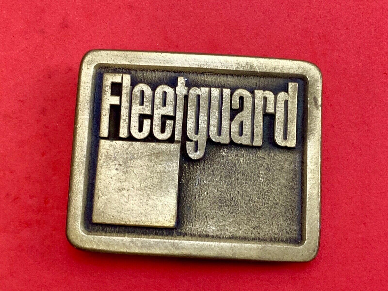 Vintage Fleetguard Construction Equipment Company Advertising Belt Buckle 