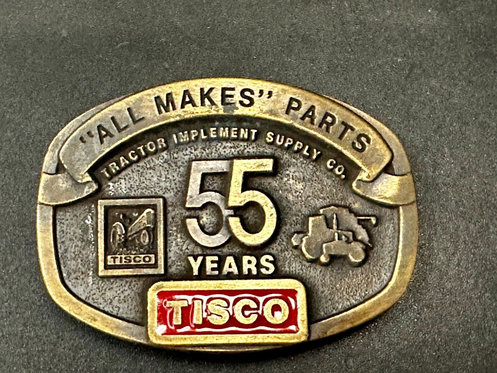 55 Years TISCO Tractor Implement Supply company NOS Belt Buckle by Speccast