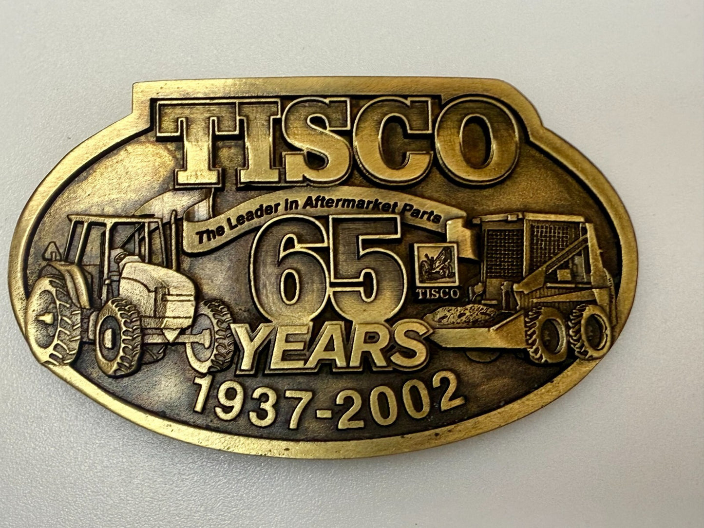 TISCO The Leader in Aftermarket Parts 65 Years 1937-2002 SPEC-CAST Belt Buckle