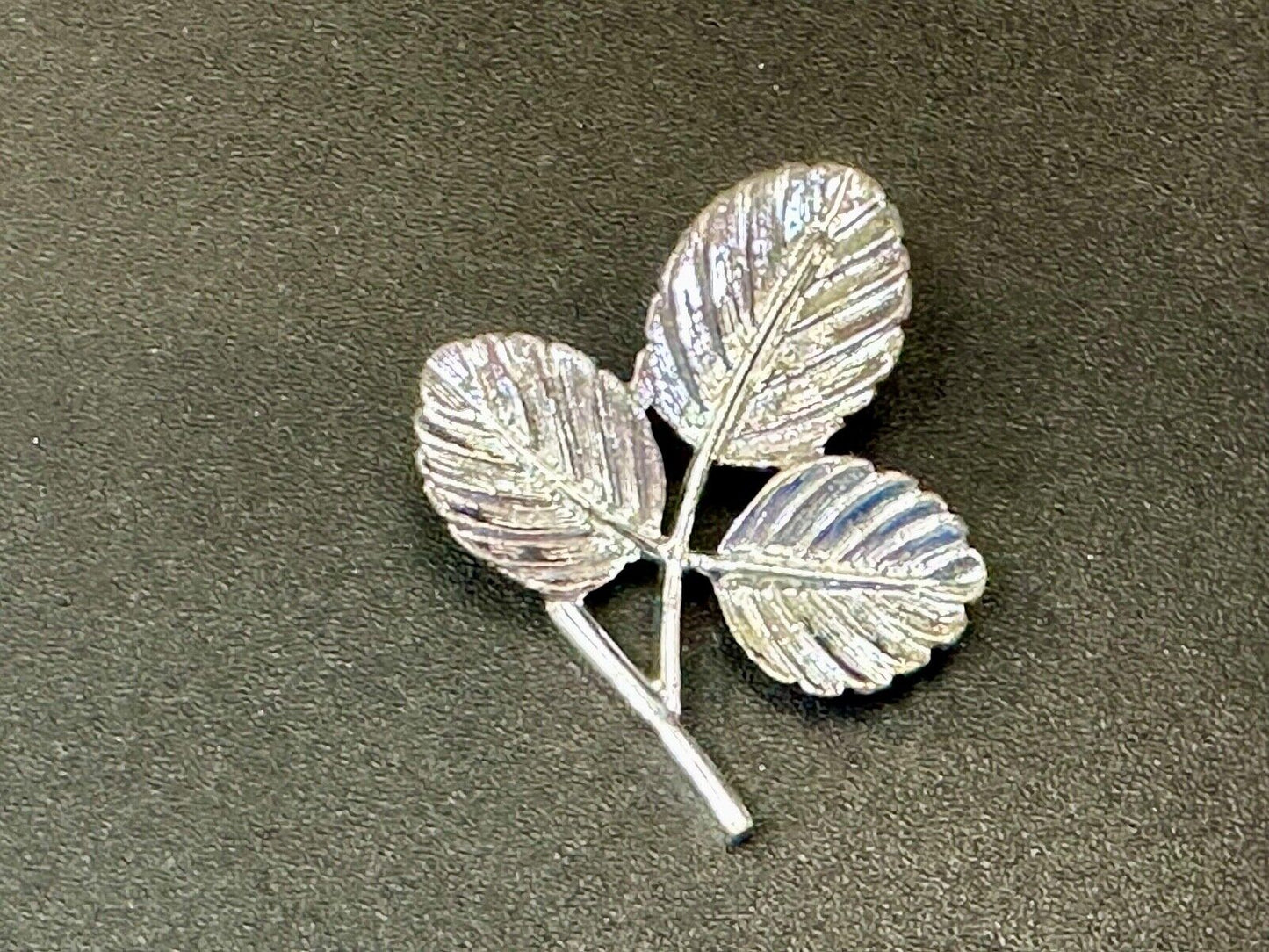 Three Leaf cutout Sarah Coventry signed silver tone brooch pin