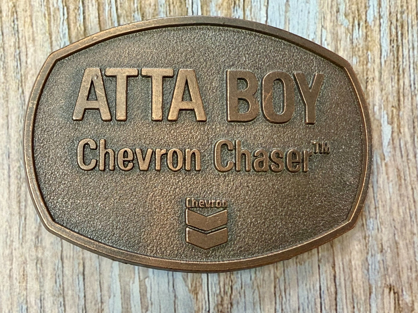 ATTA BOY Chevron Chaser Fuel Oil Mine Industry Rough Neck NOS Vtg. Belt Buckle