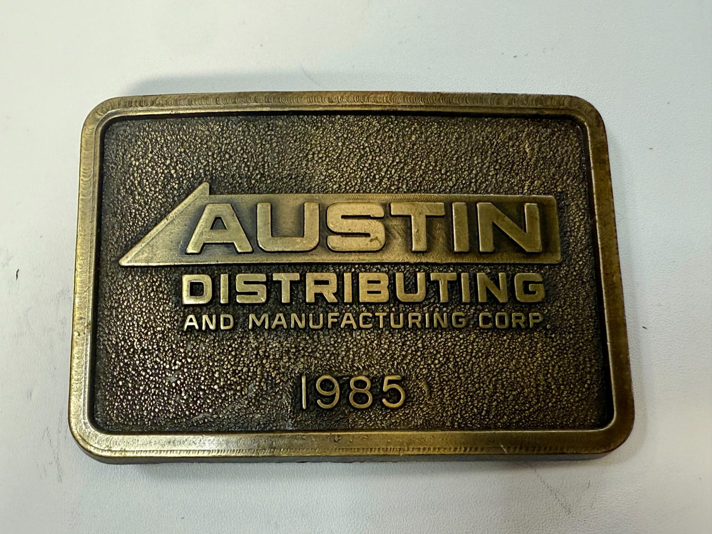 Austin Texas Distributing and Manufacturing Corp 1985 NOS RJ Belt Buckle