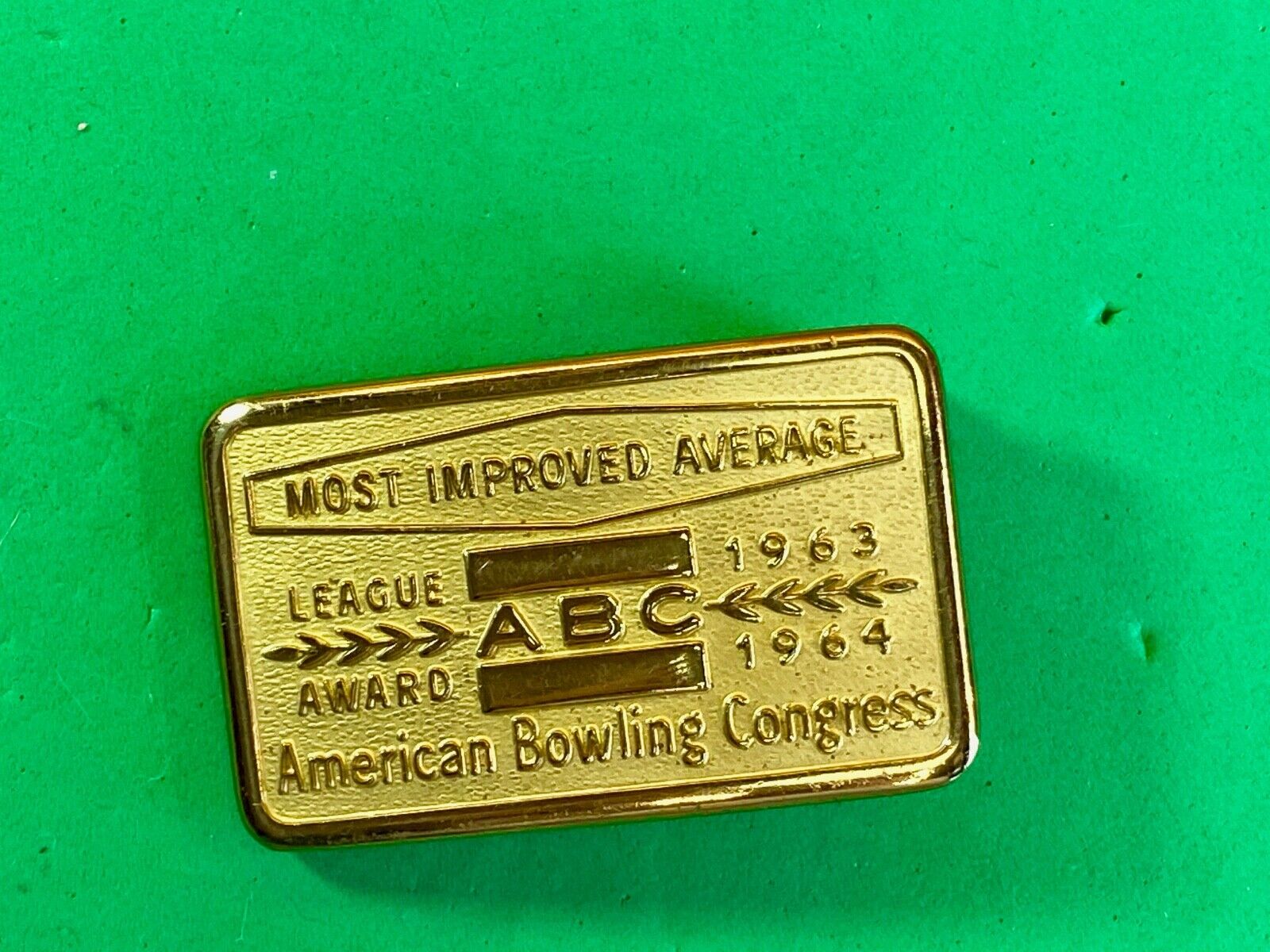 1963, 64 American Bowling Congress Most Improved Average Award Belt Buckle