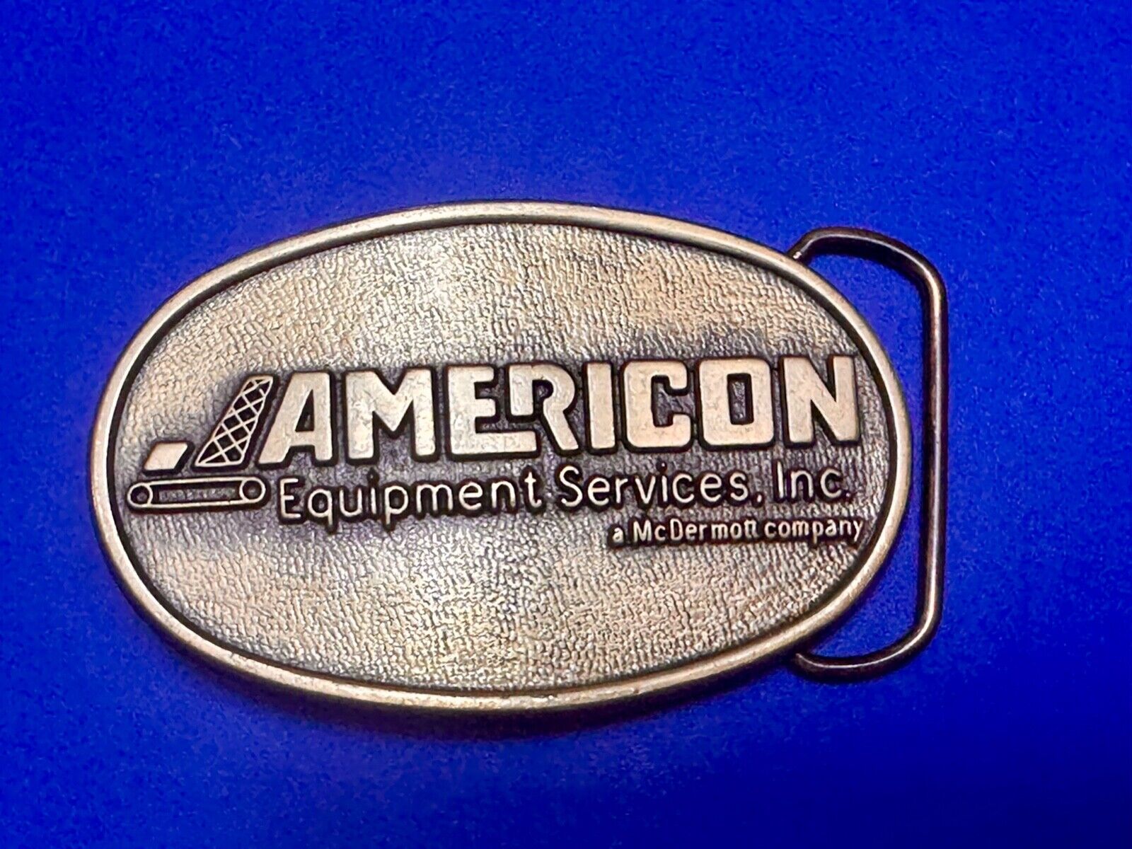 American Equipment services inc - McDermor Company Promotional belt buckle