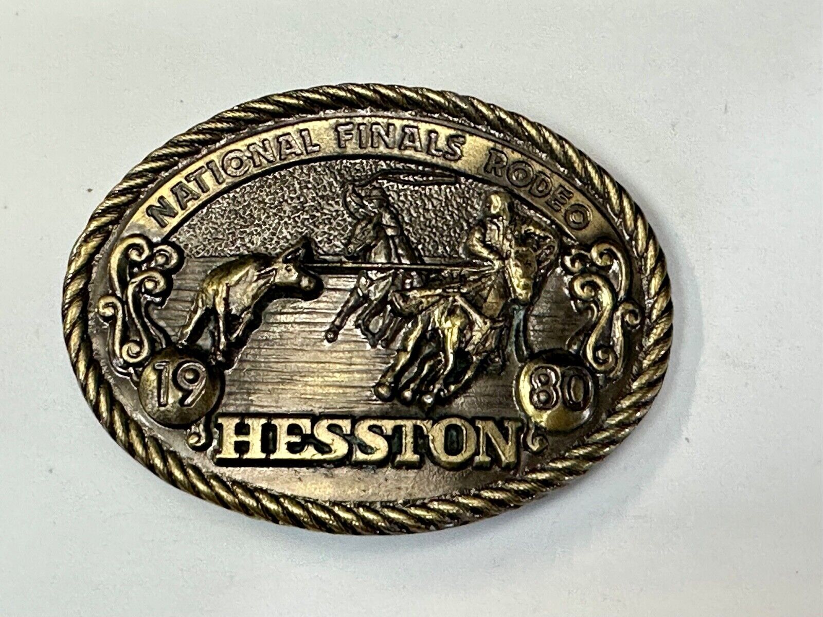 1980 NFR Rodeo Vintage Hesston Cow Roping Steer Wrestling Cowboy belt buckle