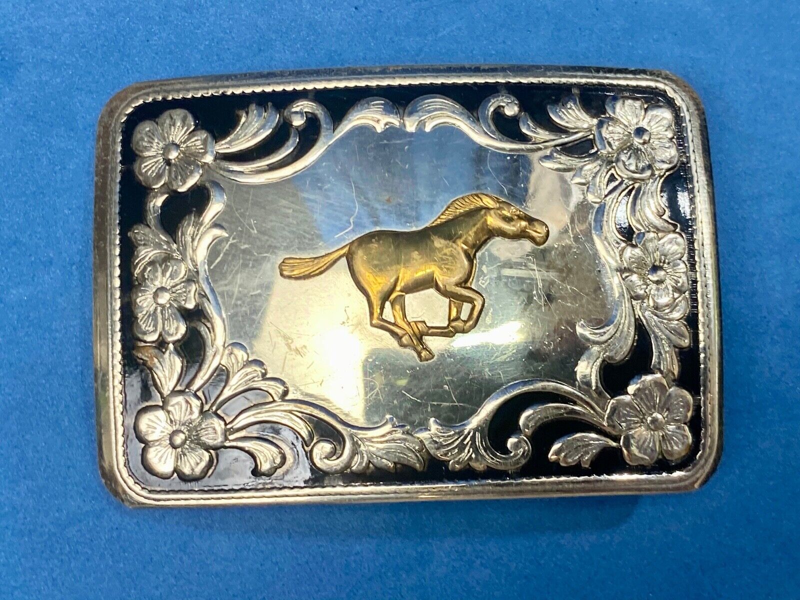 Antique Horse western Nickle Silver and black paint flower swirl belt buckle 