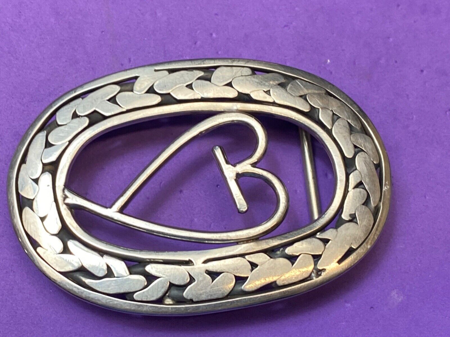 Artisan Beautiful Heart inside of open oval flower Art belt buckle