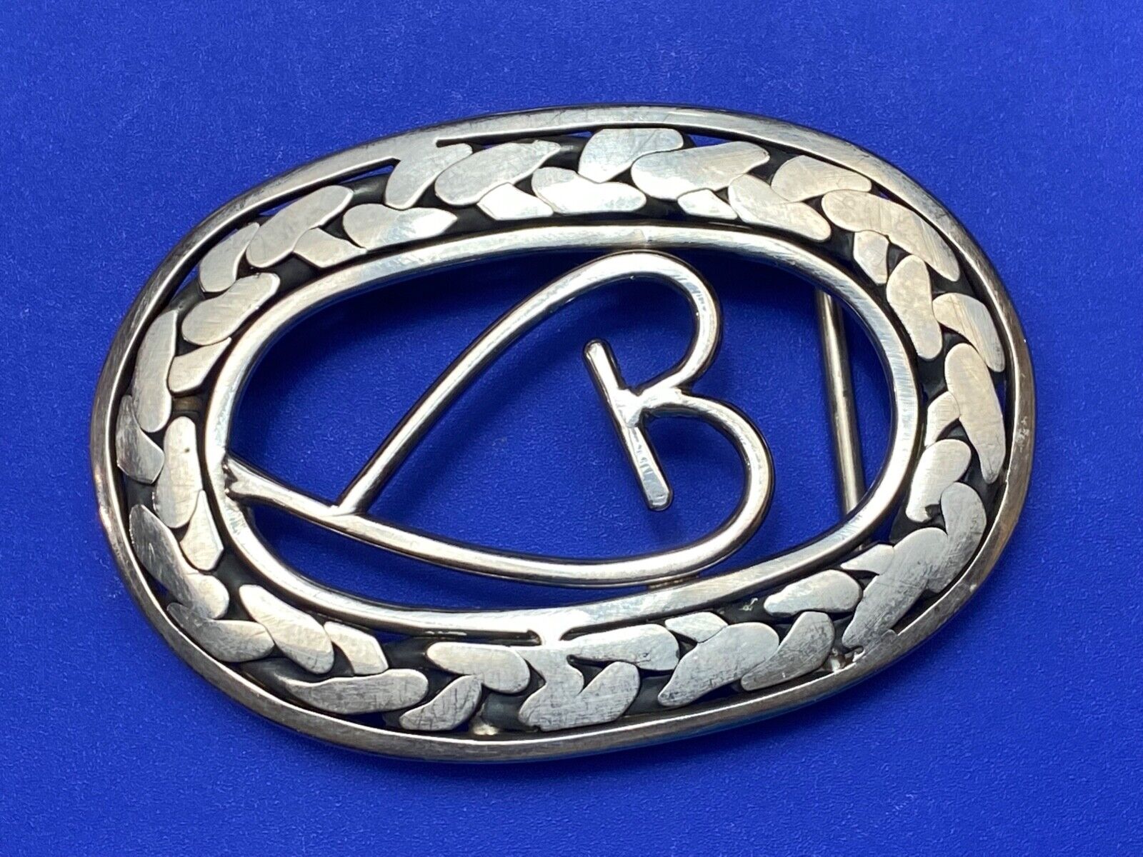 Artisan Beautiful Heart inside of open oval flower Art belt buckle