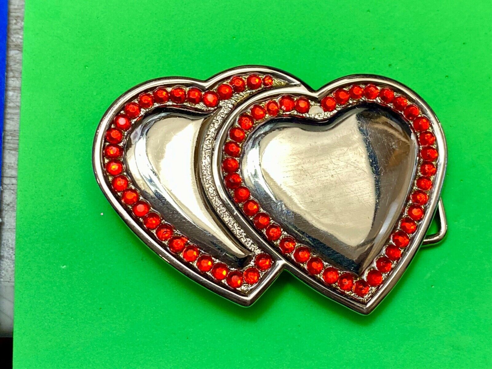 Two Jeweled Hearts Red Rhinestone outlining silver tone cutout belt buckle