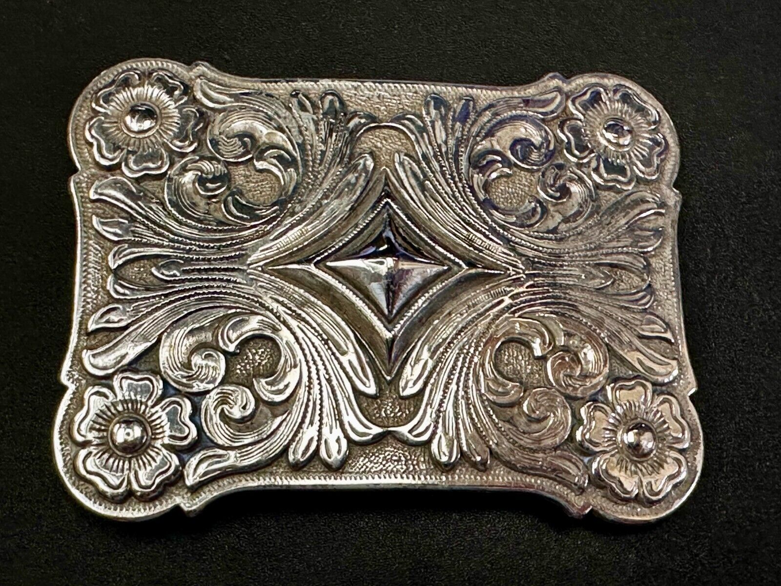 Vintage Ivan Brand Raised Diamond Center Flower Swirl Design Belt Buckle