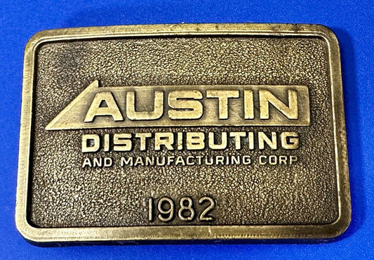 Austin Texas Distributing and Manufacturing 1982 Advertisement Promo Belt Buckle