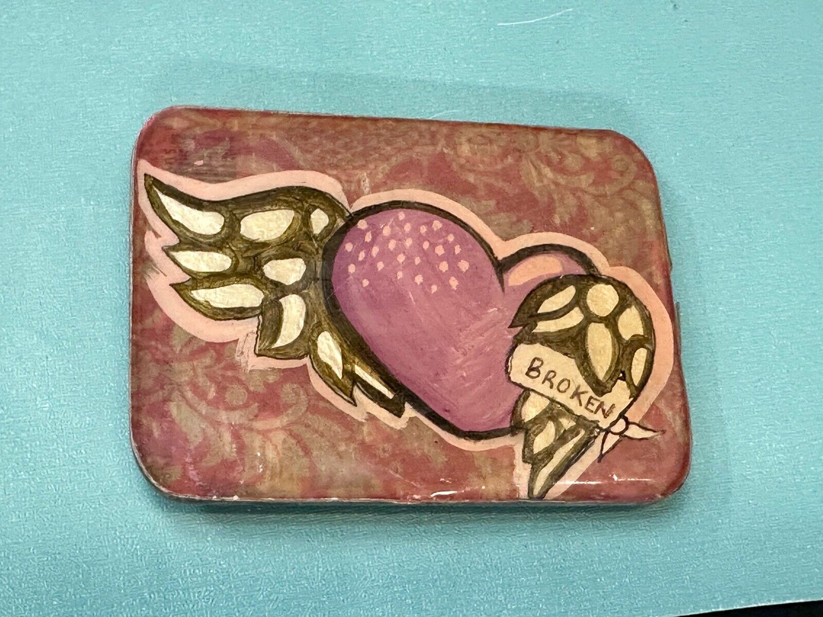 Vintage HEART with wings Mexican Collage belt buckle by artisan Nikki Zabicki