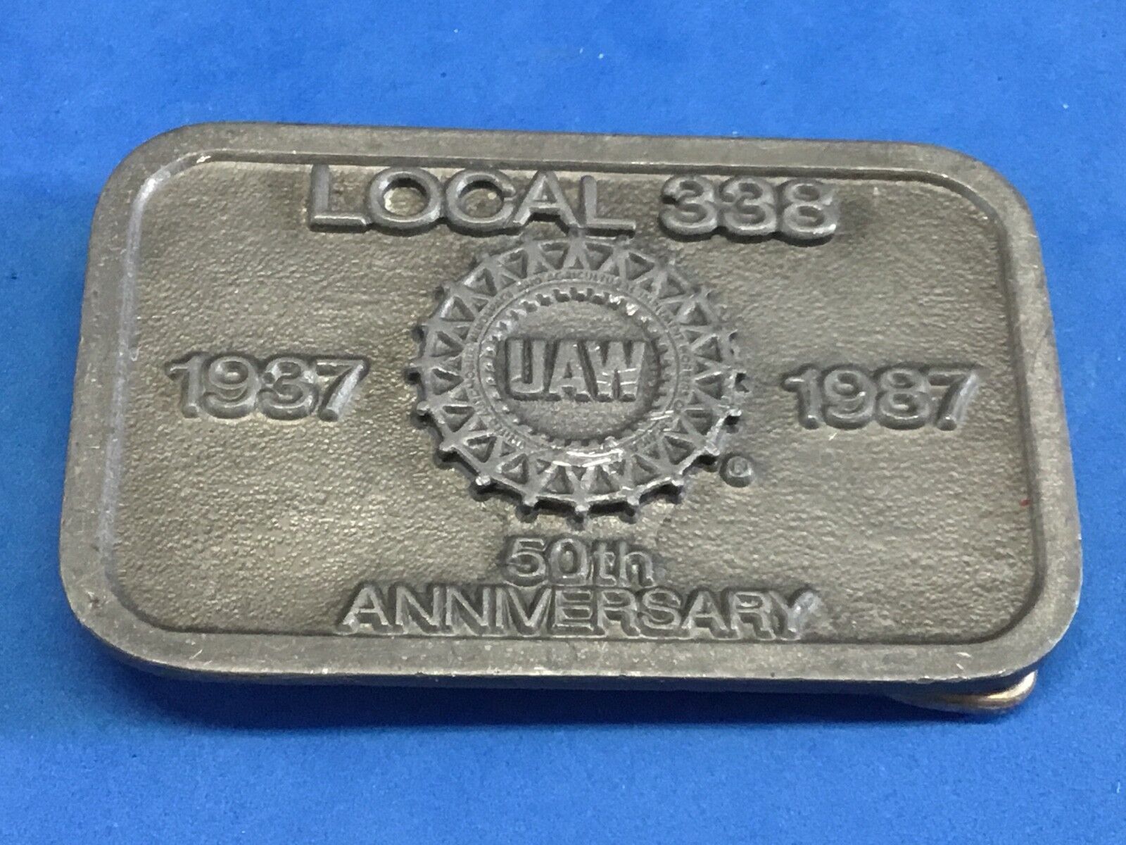 UAW Local 338 belt buckle      1987 -50th aniversery United Auto Workers  