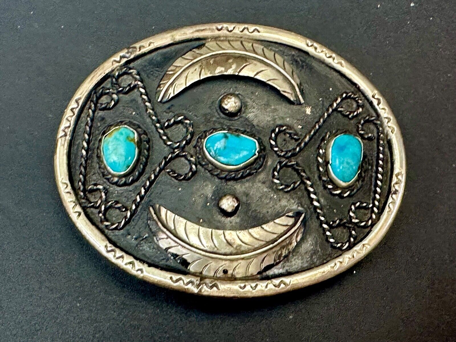 Turquoise stones raised feathers vintage belt buckle marked Sterling 0925 Mexico