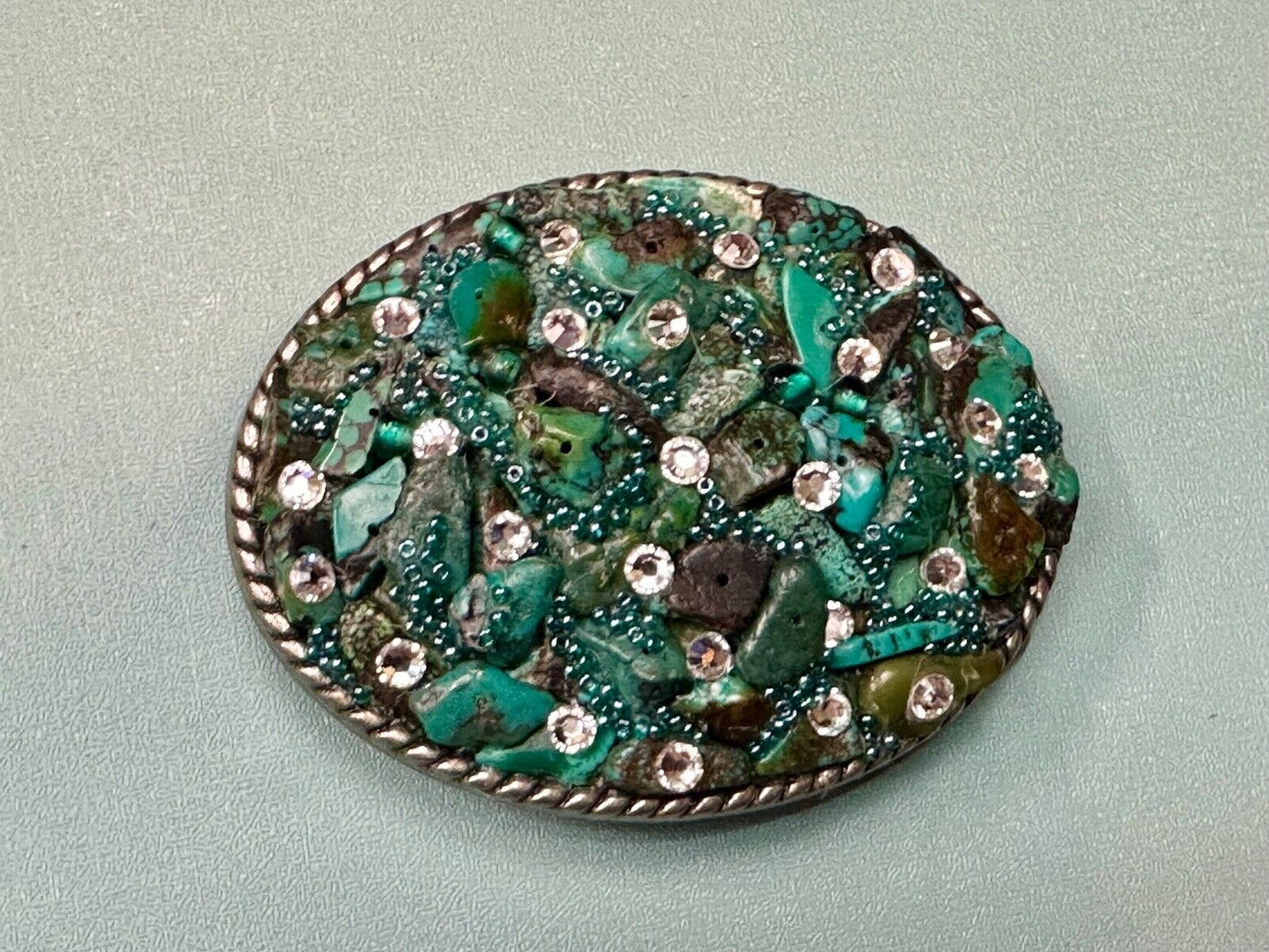 Artisan Chunky shades of Green and clear rhinestone mixed material belt buckle