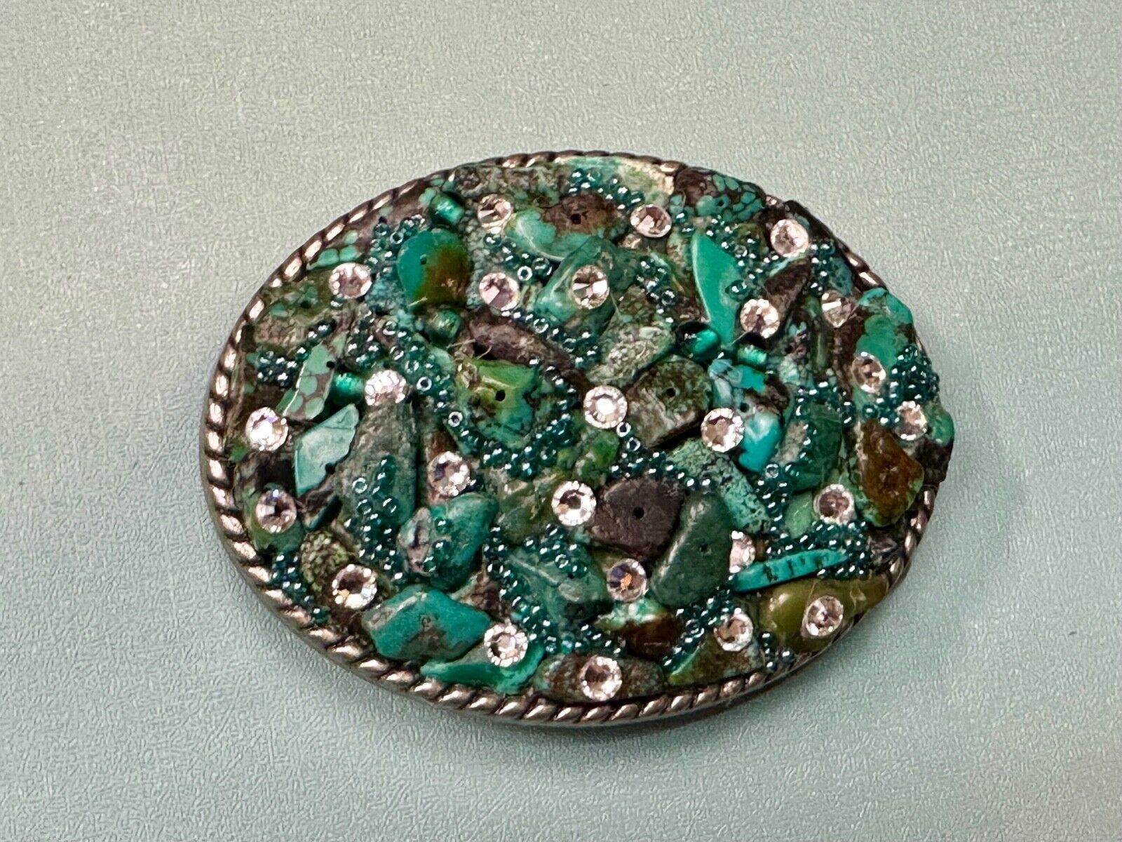 Artisan Chunky shades of Green and clear rhinestone mixed material belt buckle
