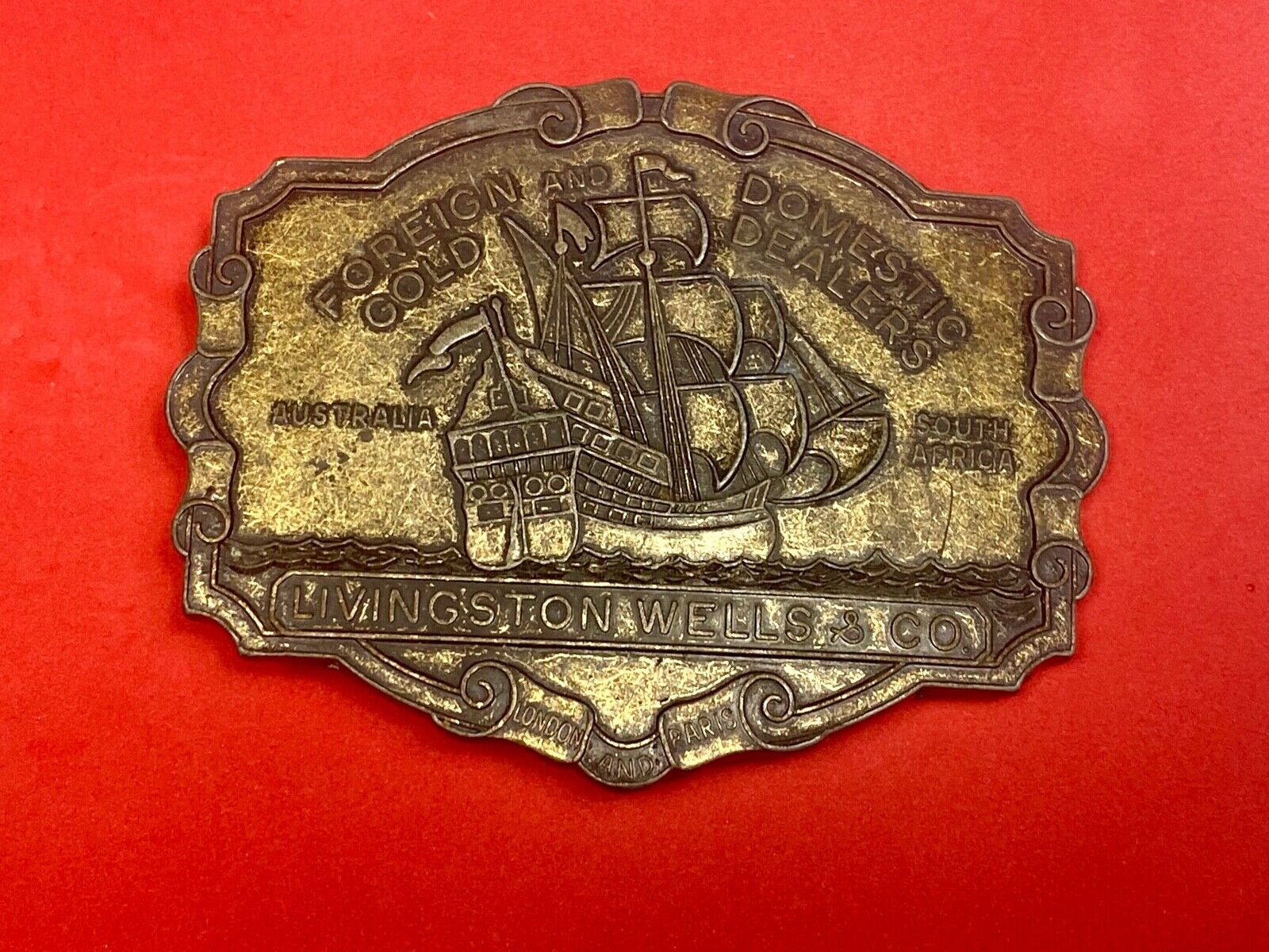 VINTAGE ANTIQUE METAL BELT BUCKLE- Livingston Wells & Co Sailboat Ship